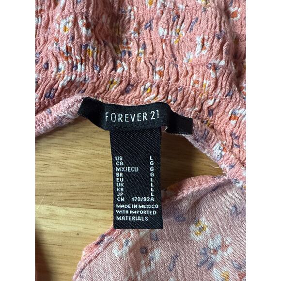 Floral blouse with open back size L
Ptp-19
Length-17 - Picture 4 of 4